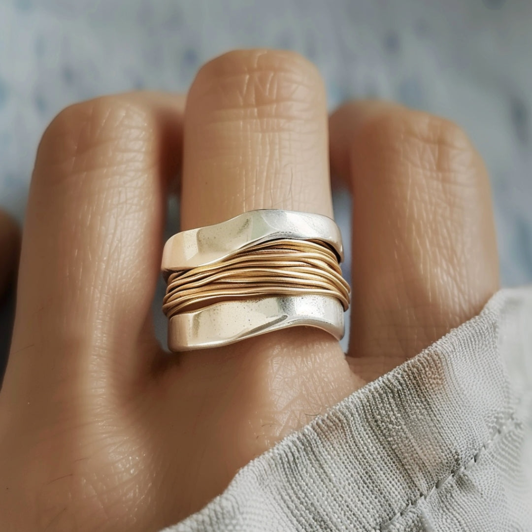 ELEGANTE ANILLO BICOLOR PLATA Y ORO